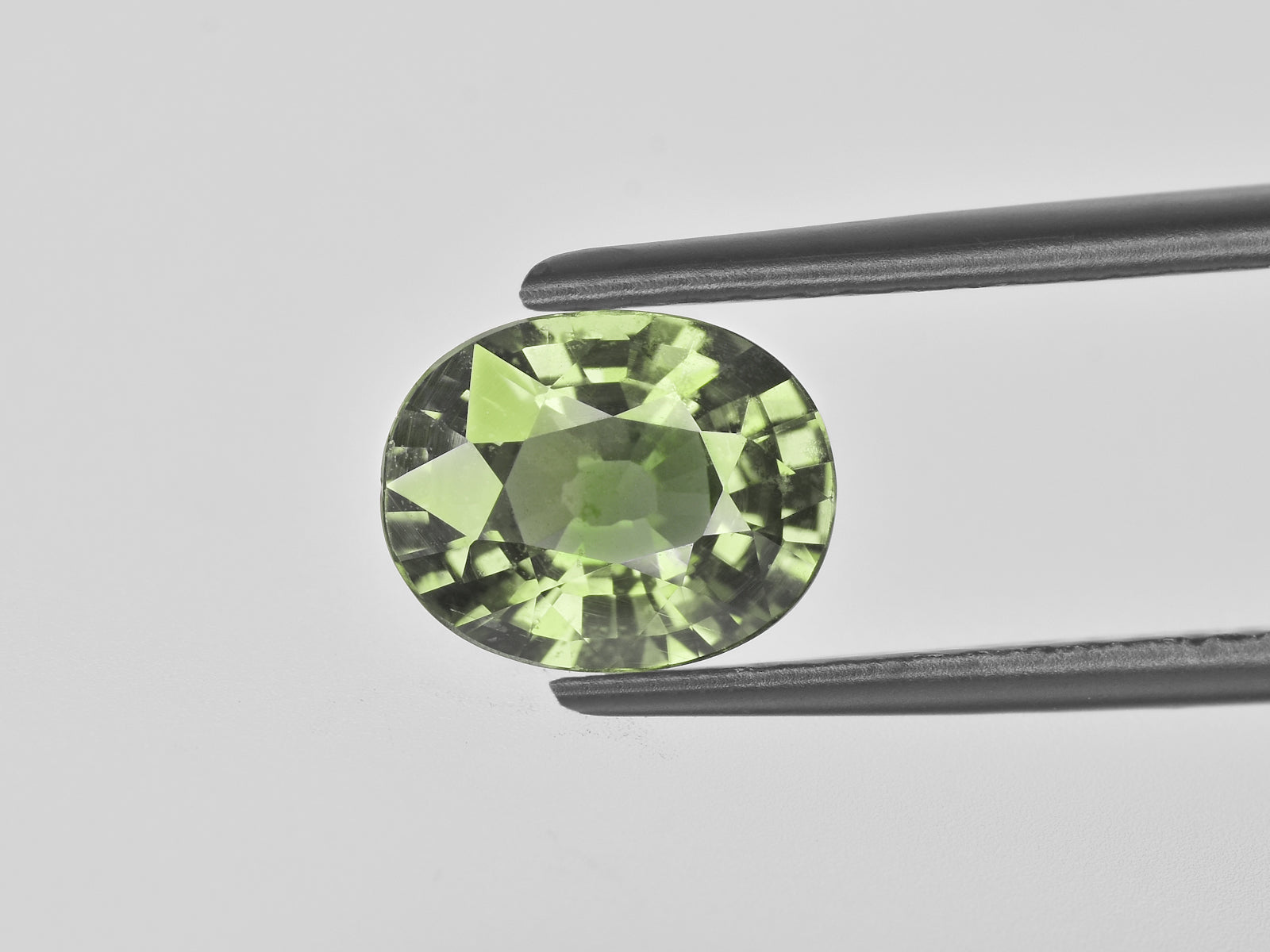 8800654-oval-olive-green-aigs-madagascar-natural-other-fancy-sapphire-2.16-ct