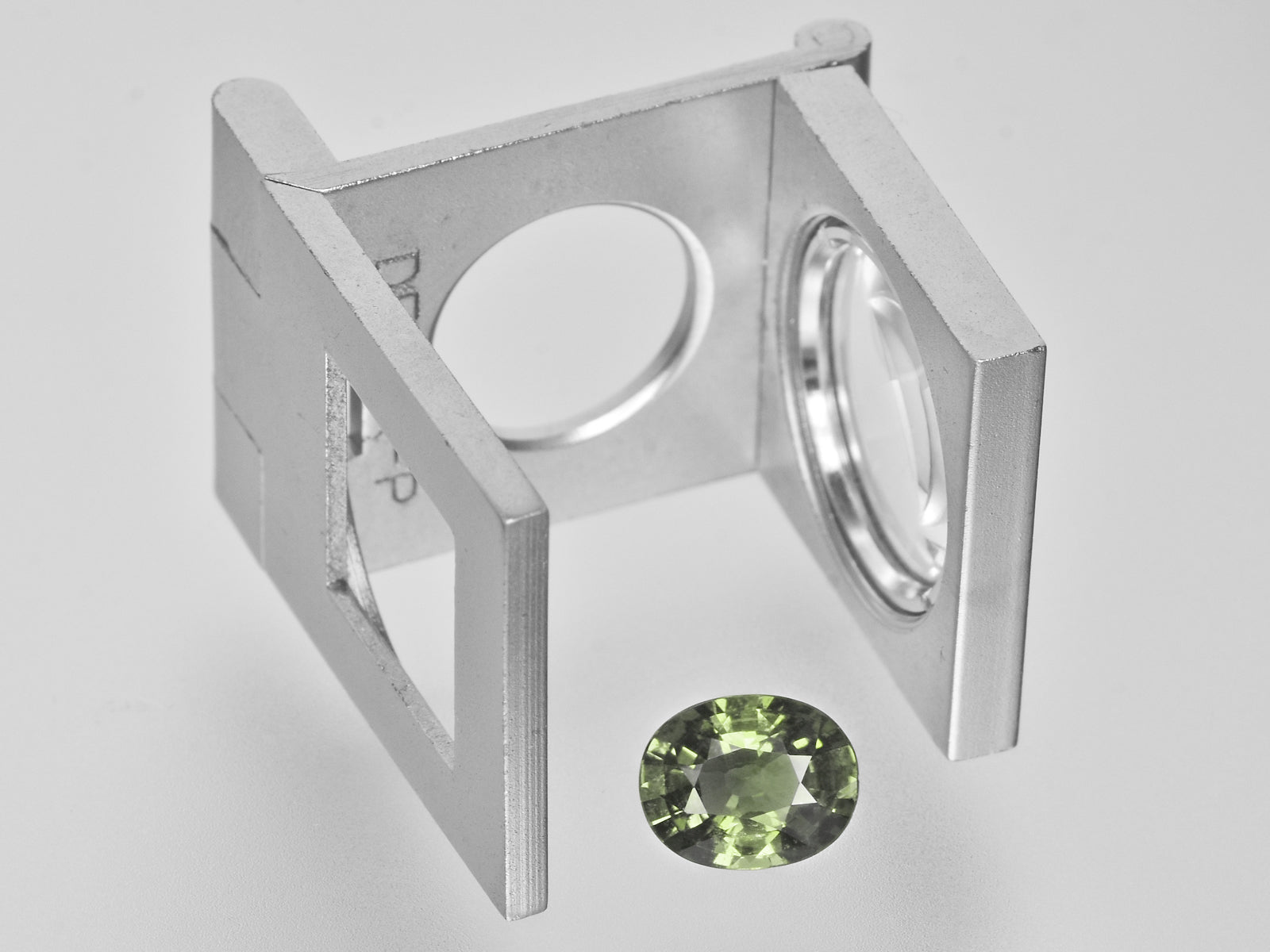 8800654-oval-olive-green-aigs-madagascar-natural-other-fancy-sapphire-2.16-ct
