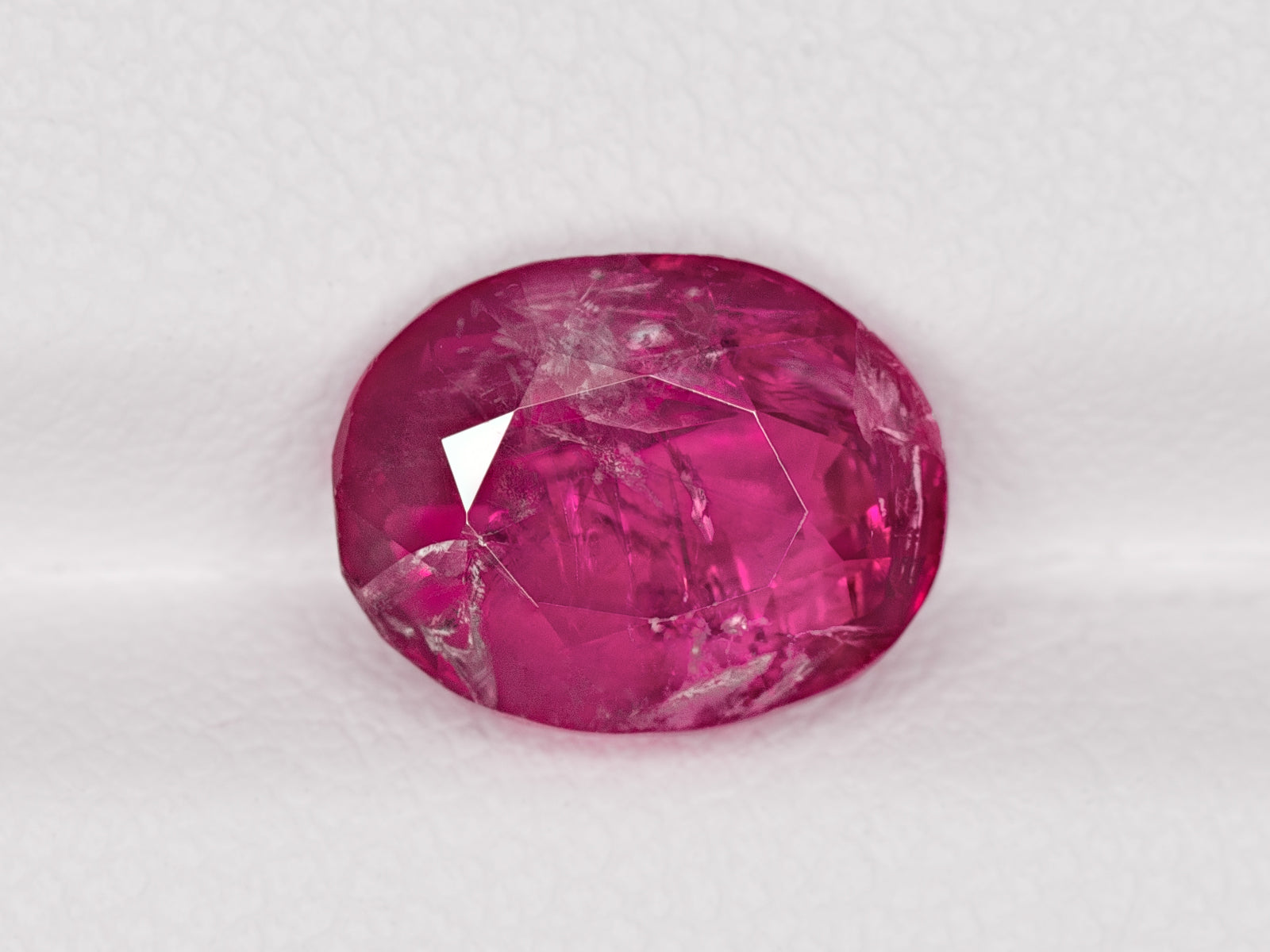 8802830-oval-deep-pinkish-red-igi-burma-natural-ruby-4.37-ct