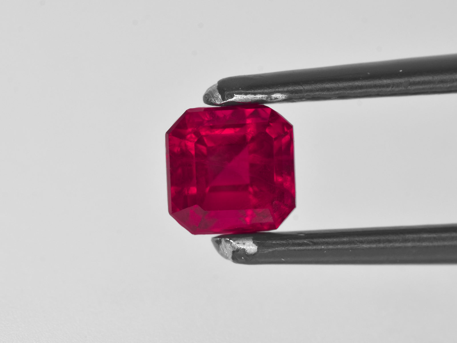 8801038-octagonal-fiery-neon-pinkish-red-grs-usa-natural-bixbite-red-emerald-0.69-ct