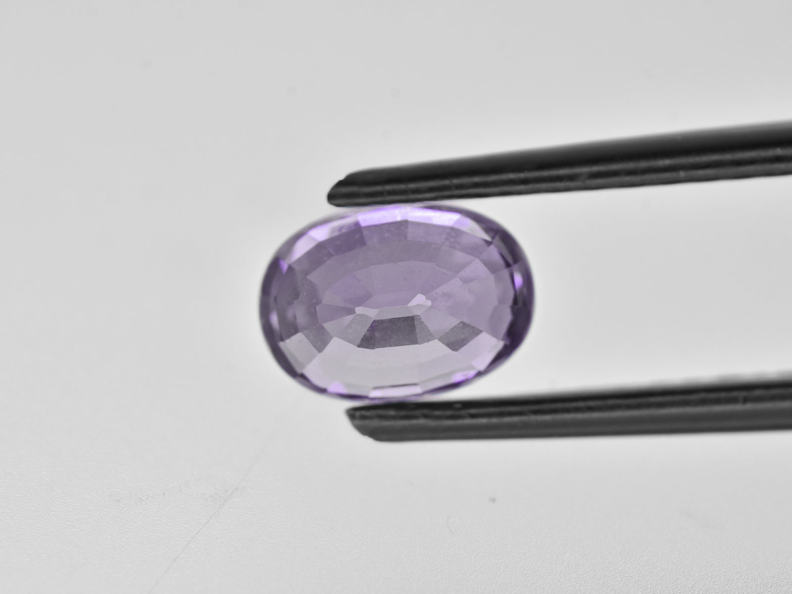 8800657-oval-greyish-violet-igi-madagascar-natural-other-fancy-sapphire-2.39-ct