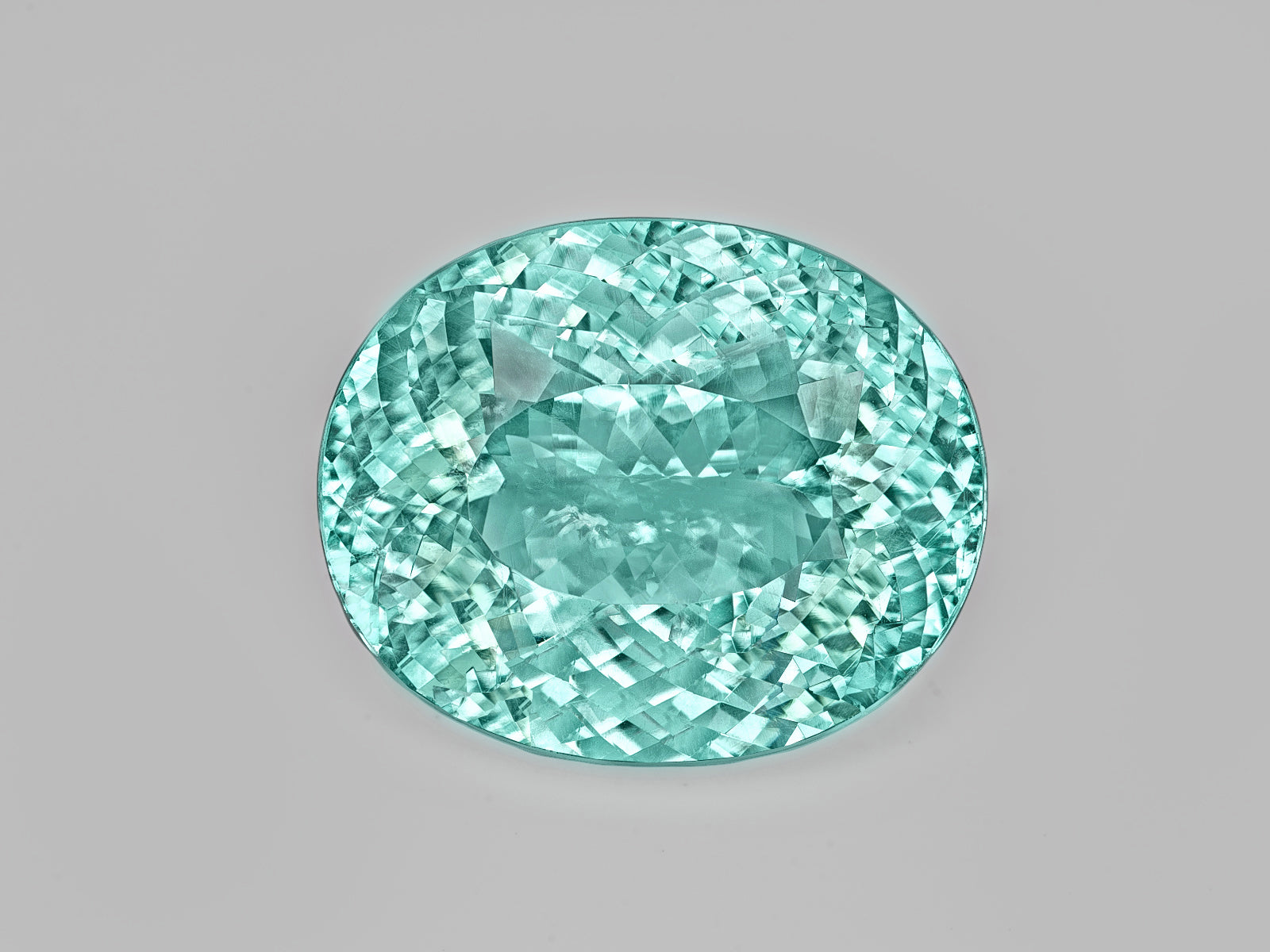 8803115-oval-fiery-neon-greenish-blue-igi-mozambique-natural-paraiba-tourmaline-22.38-ct