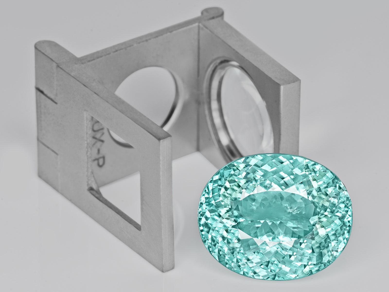 8803115-oval-fiery-neon-greenish-blue-igi-mozambique-natural-paraiba-tourmaline-22.38-ct