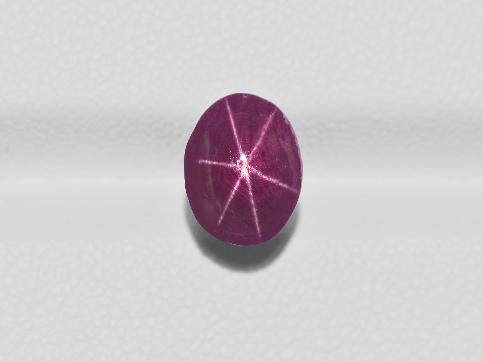 8800963-cabochon-deep-purplish-red-igi-india-natural-star-ruby-5.45-ct