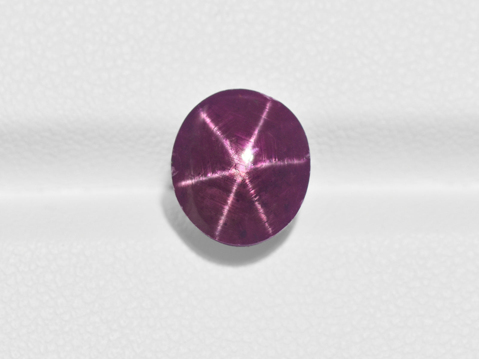8800965-cabochon-deep-purplish-red-igi-india-natural-star-ruby-6.63-ct