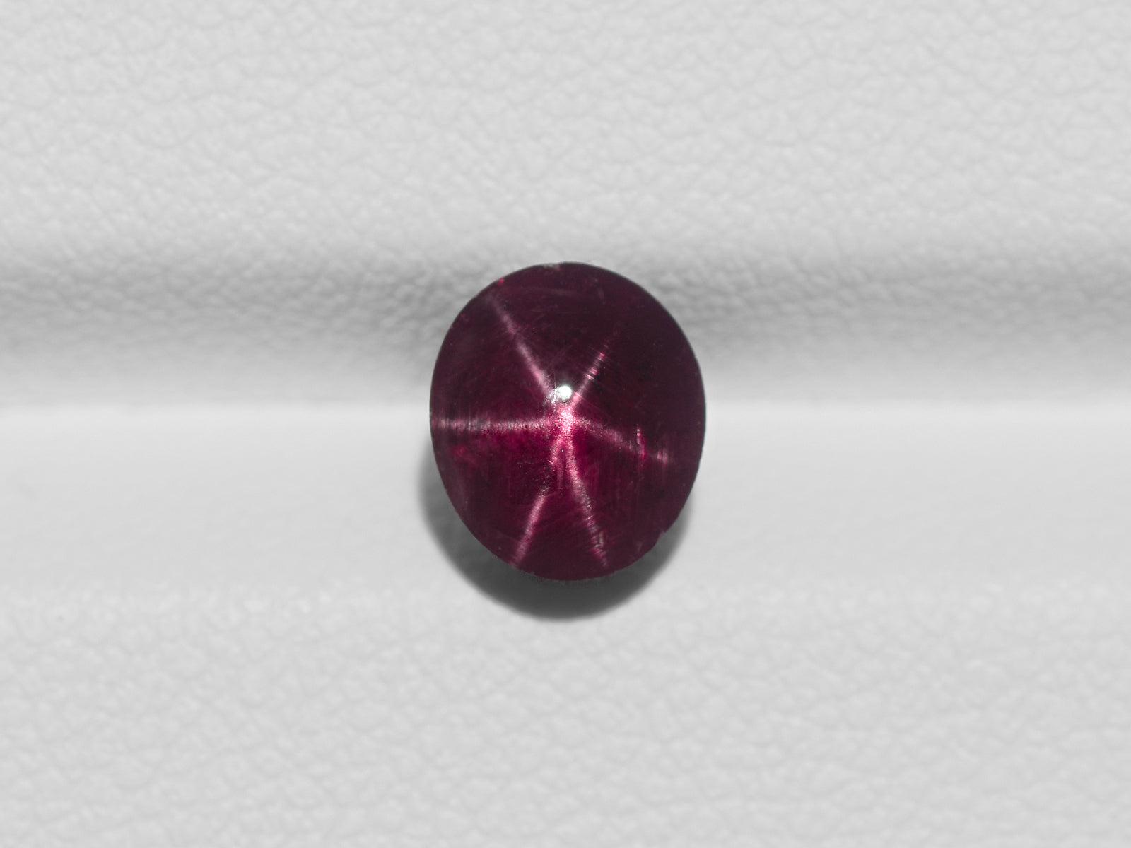 8800956-cabochon-dark-purple-red-igi-india-natural-star-ruby-2.39-ct