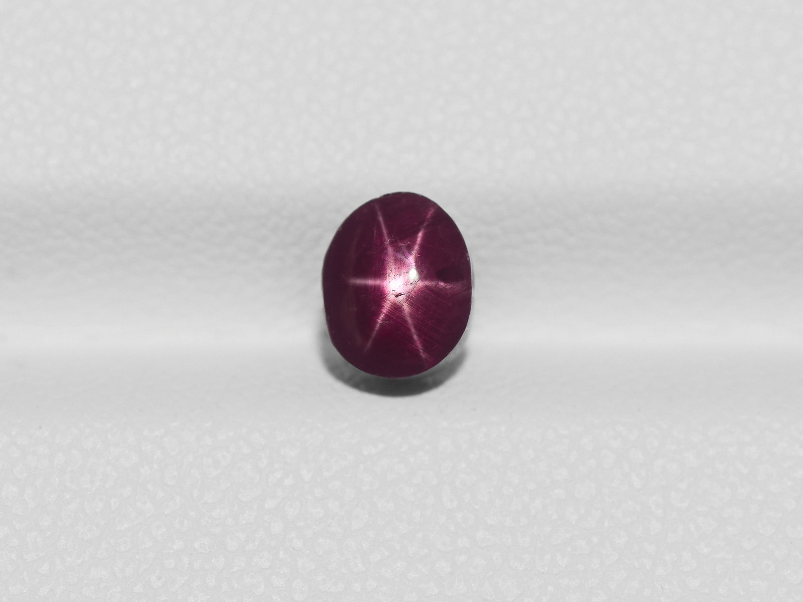 8800957-cabochon-deep-purple-red-igi-india-natural-star-ruby-1.69-ct