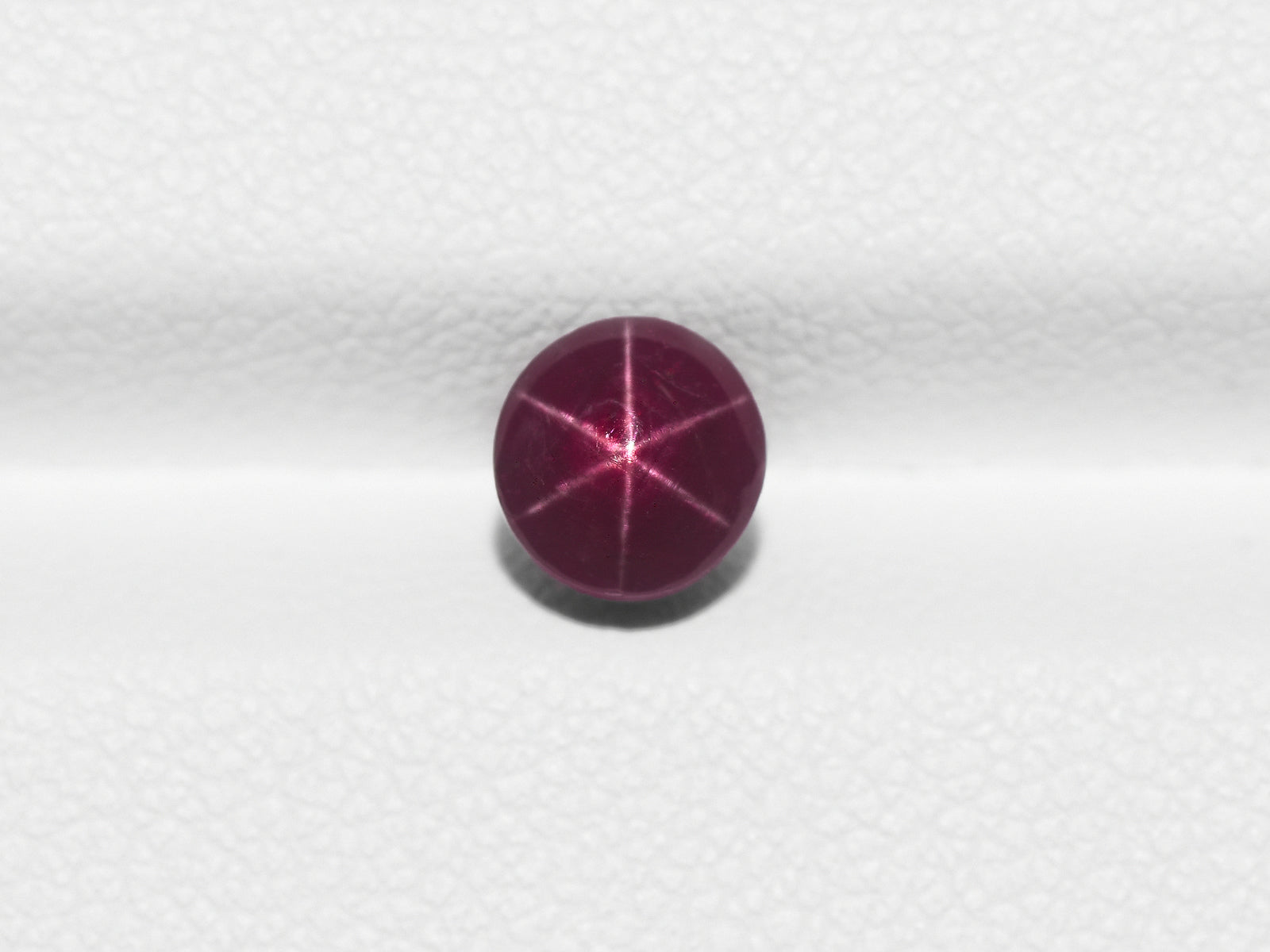 8800959-cabochon-deep-purplish-red-igi-india-natural-star-ruby-1.74-ct