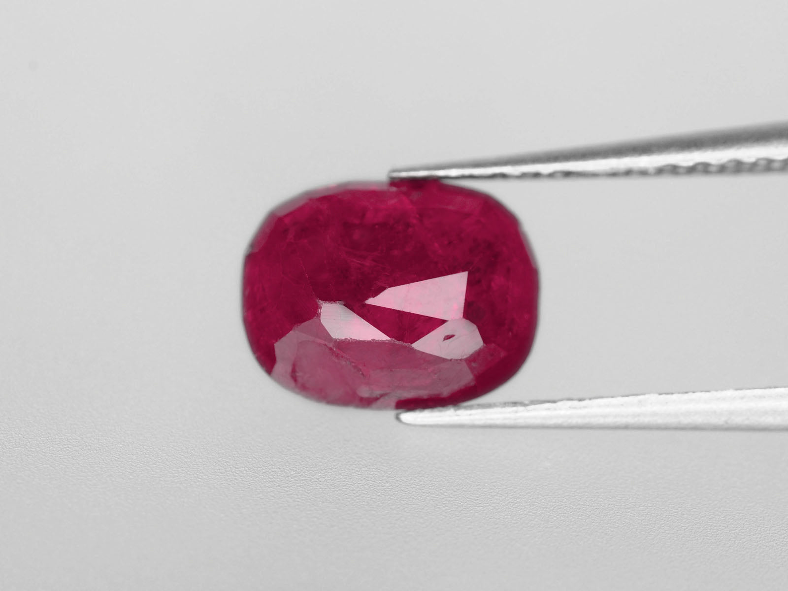 8800442-cushion-intense-red-with-slight-pinkish-hue-igi-burma-natural-ruby-1.63-ct