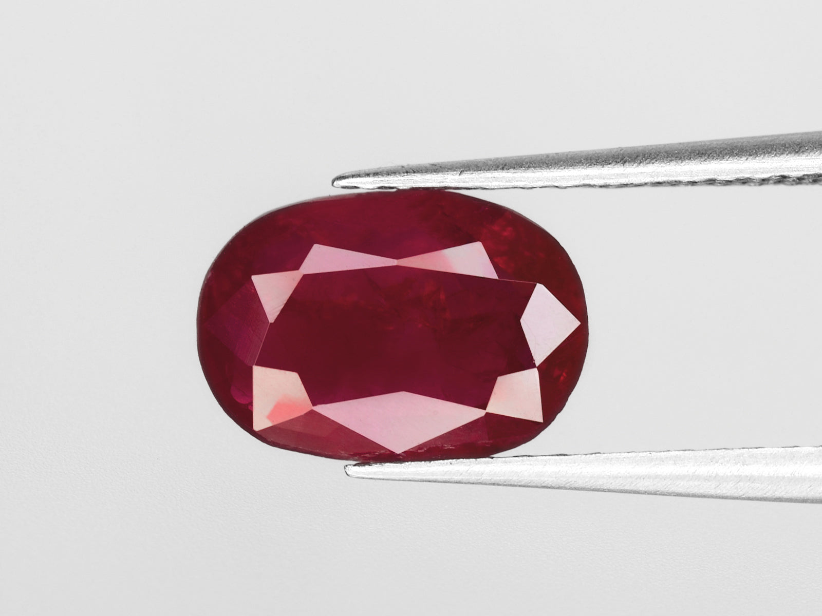 8800448-oval-red-with-a-slight-pinkish-hue-igi-burma-natural-ruby-1.39-ct
