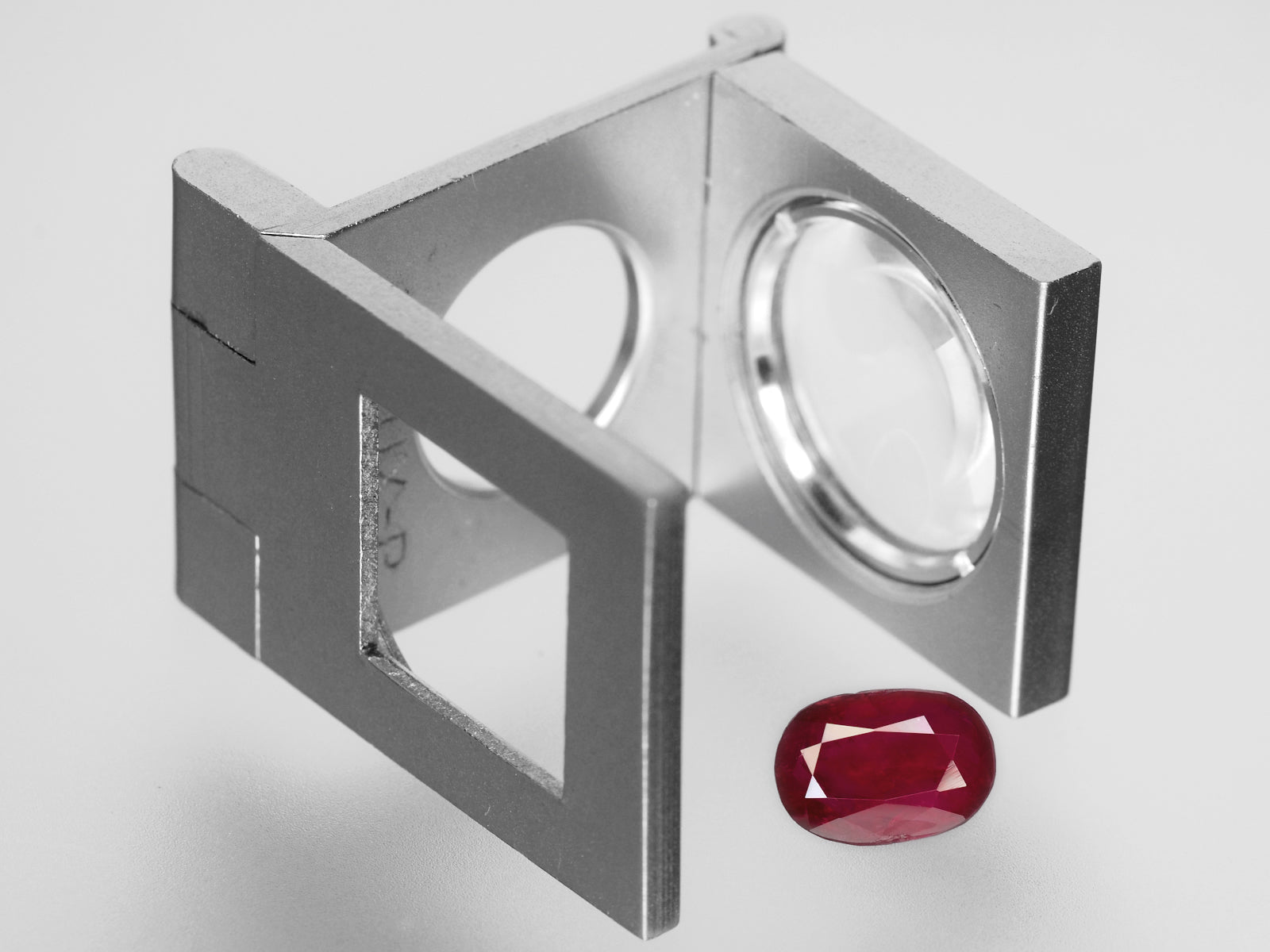 8800448-oval-red-with-a-slight-pinkish-hue-igi-burma-natural-ruby-1.39-ct