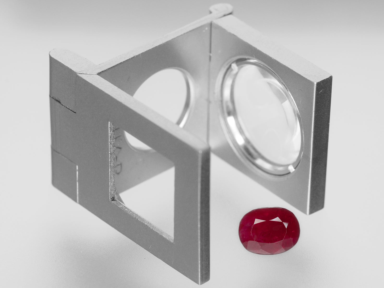 8800454-oval-deep-pinkish-red-igi-burma-natural-ruby-2.42-ct