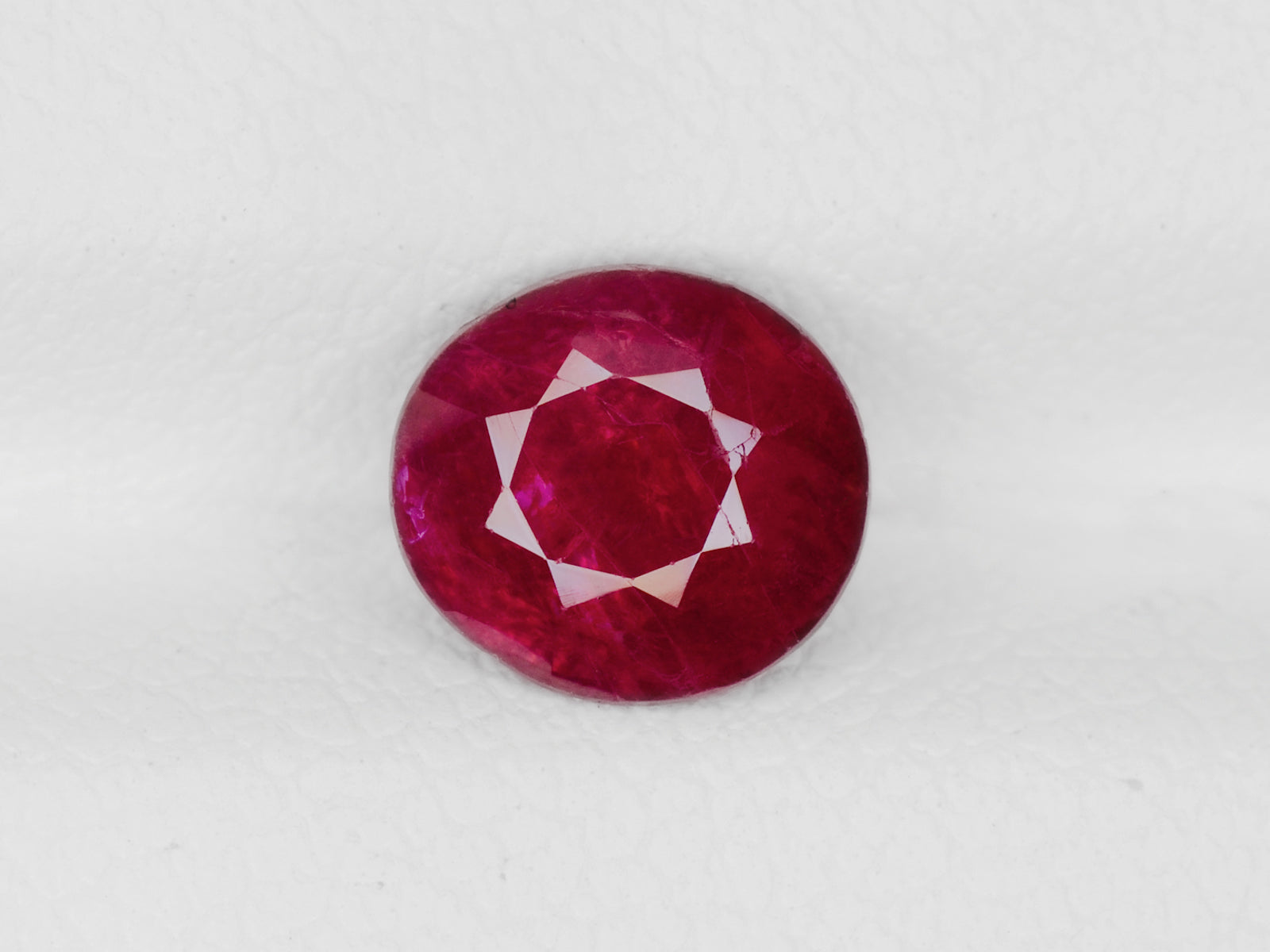 8800456-oval-deep-pinkish-red-igi-burma-natural-ruby-1.50-ct