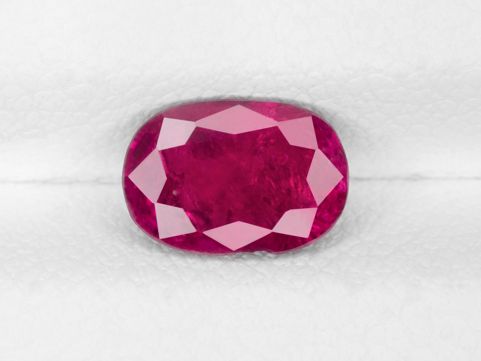 8800457-oval-pinkish-red-igi-burma-natural-ruby-1.41-ct