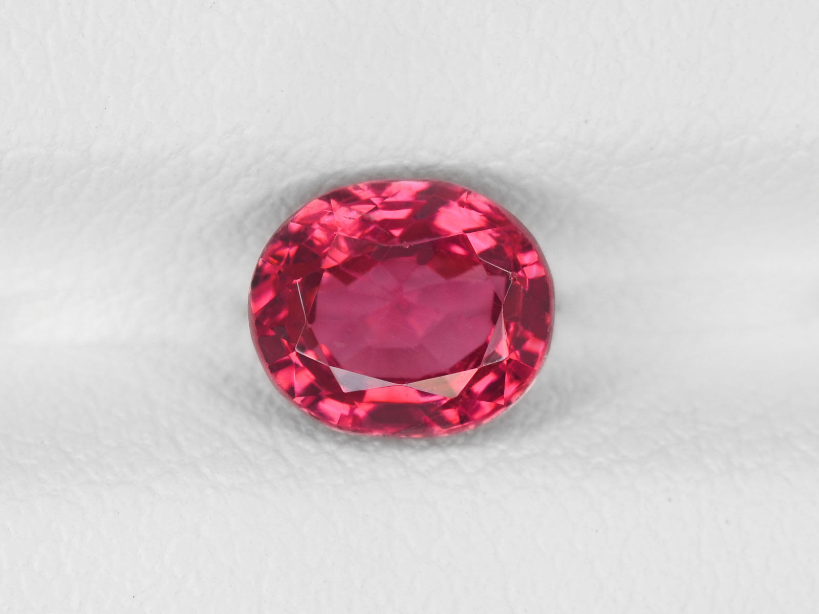 8800343-oval-intense-orangy-pink-igi-burma-natural-spinel-1.21-ct