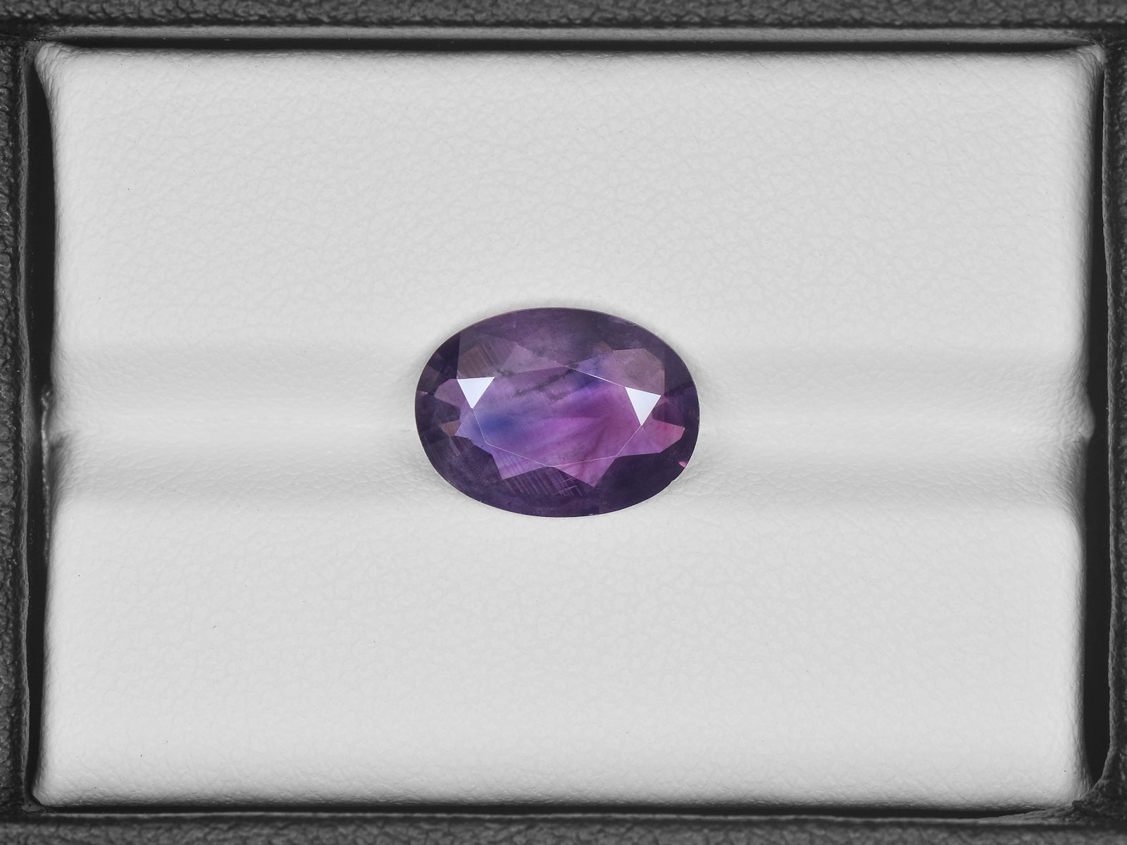8800669-oval-deep-purple-pink-with-blue-patches-igi-pakistan-natural-other-fancy-sapphire-3.62-ct