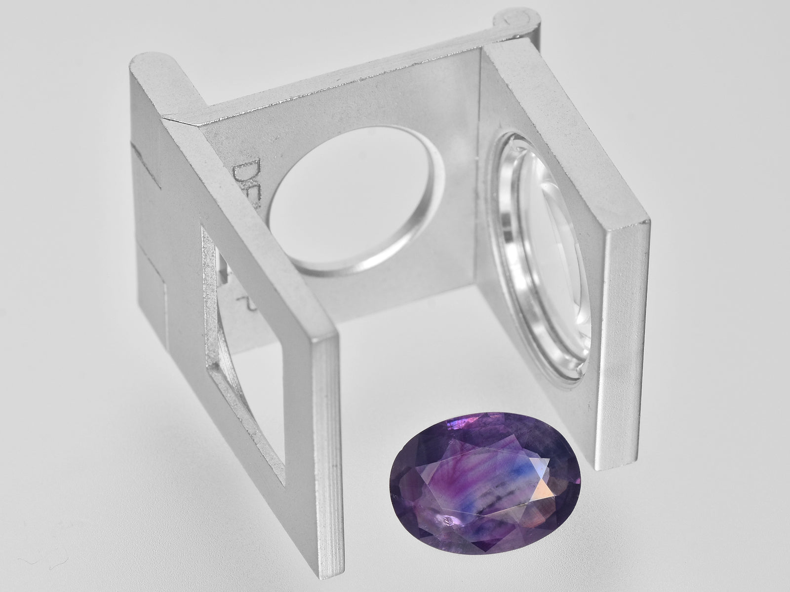 8800669-oval-deep-purple-pink-with-blue-patches-igi-pakistan-natural-other-fancy-sapphire-3.62-ct