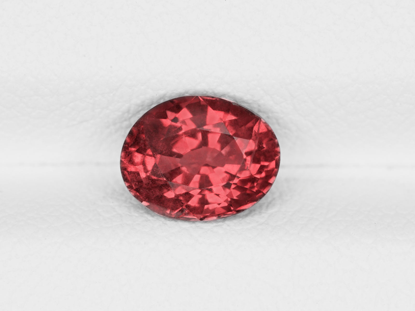 8800477-oval-fiery-pinkish-brownish-orange-igi-sri-lanka-natural-pink-sapphire-1.50-ct
