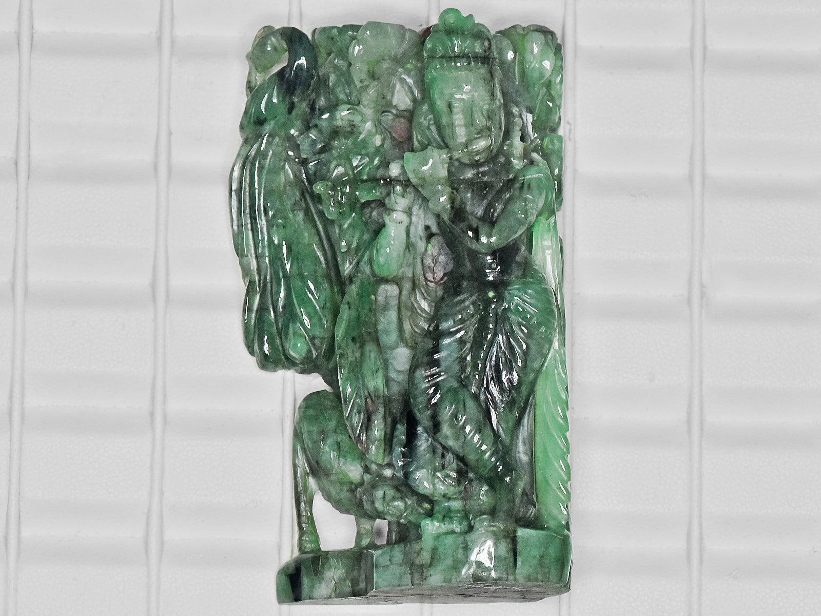 8801144-carved-green-gii-zambia-natural-emerald-399.41-ct