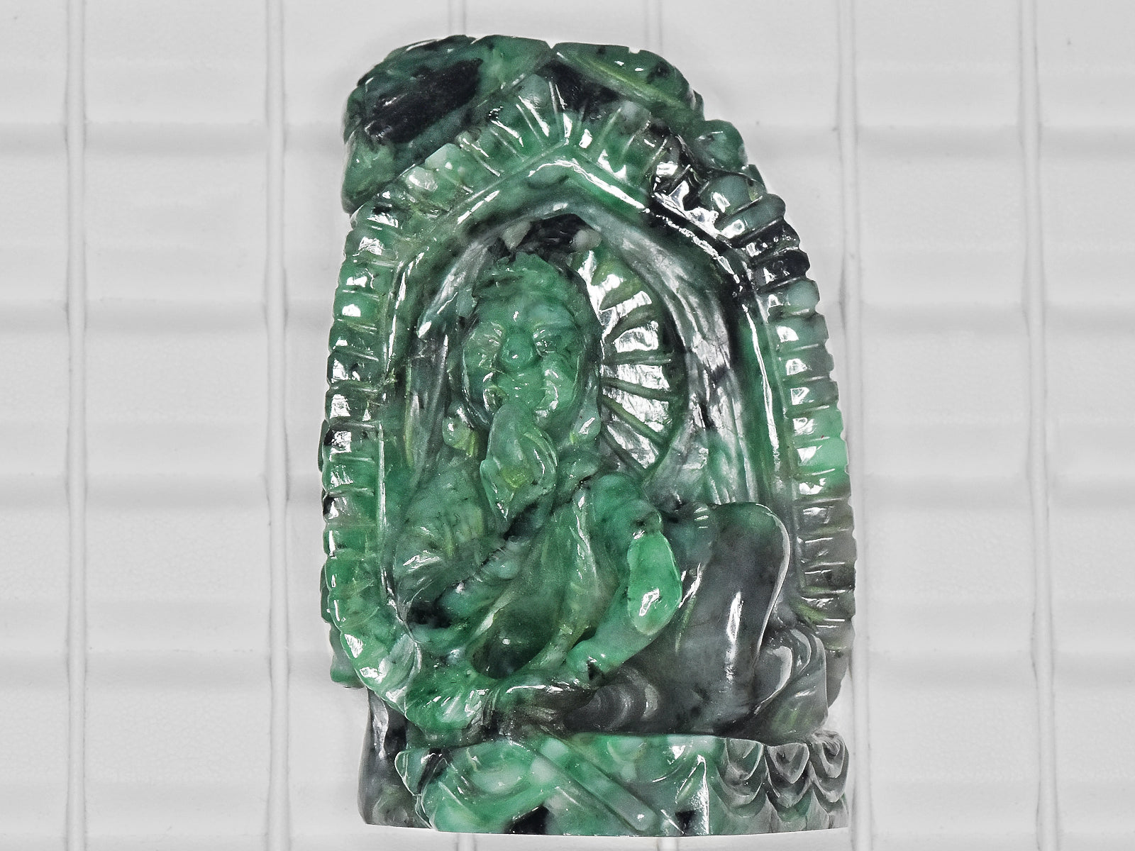 8801145-carved-green-gii-zambia-natural-emerald-745.34-ct
