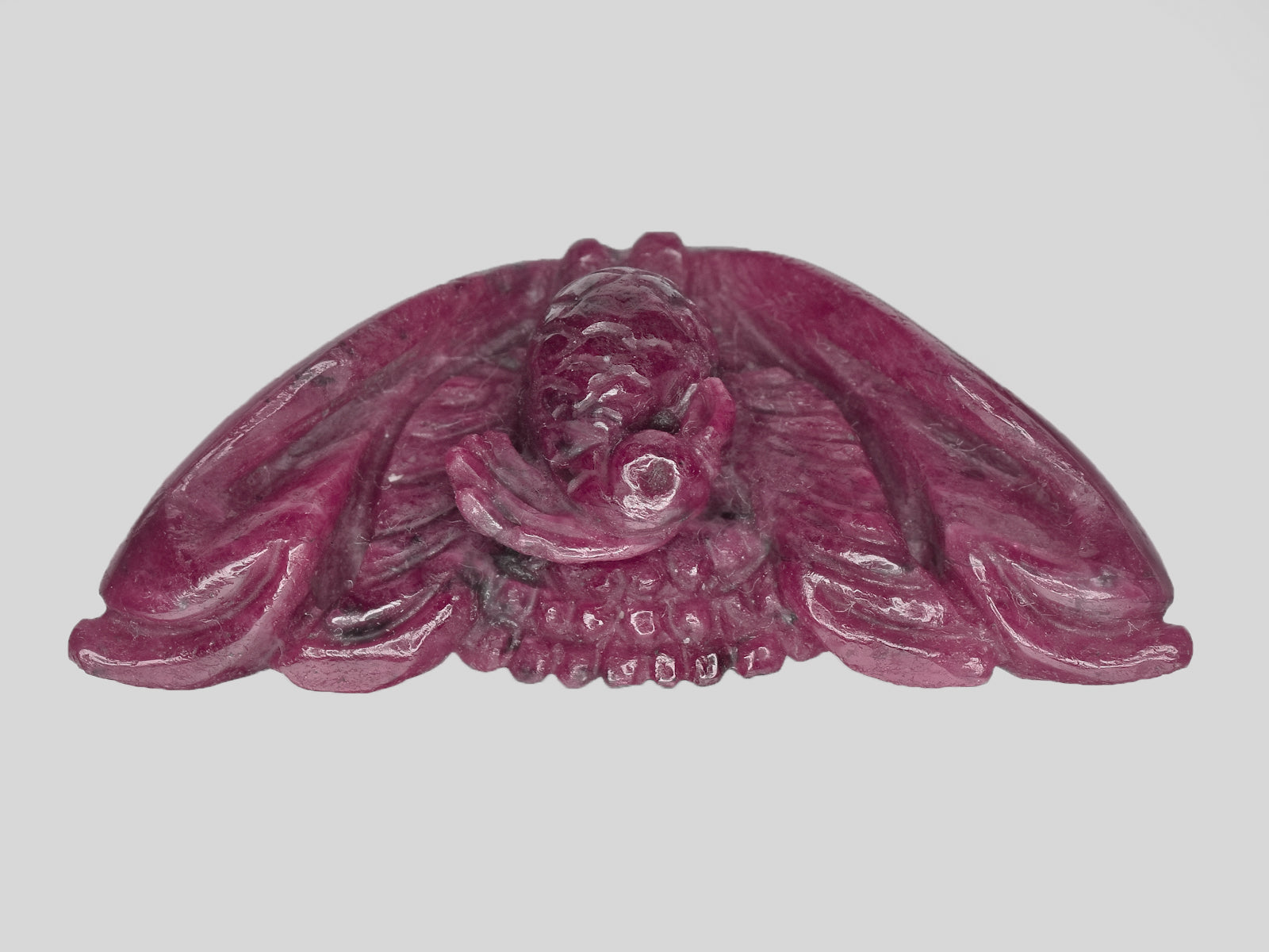 8801149-carved-maroonish-red-gii-india-natural-ruby-101.00-ct