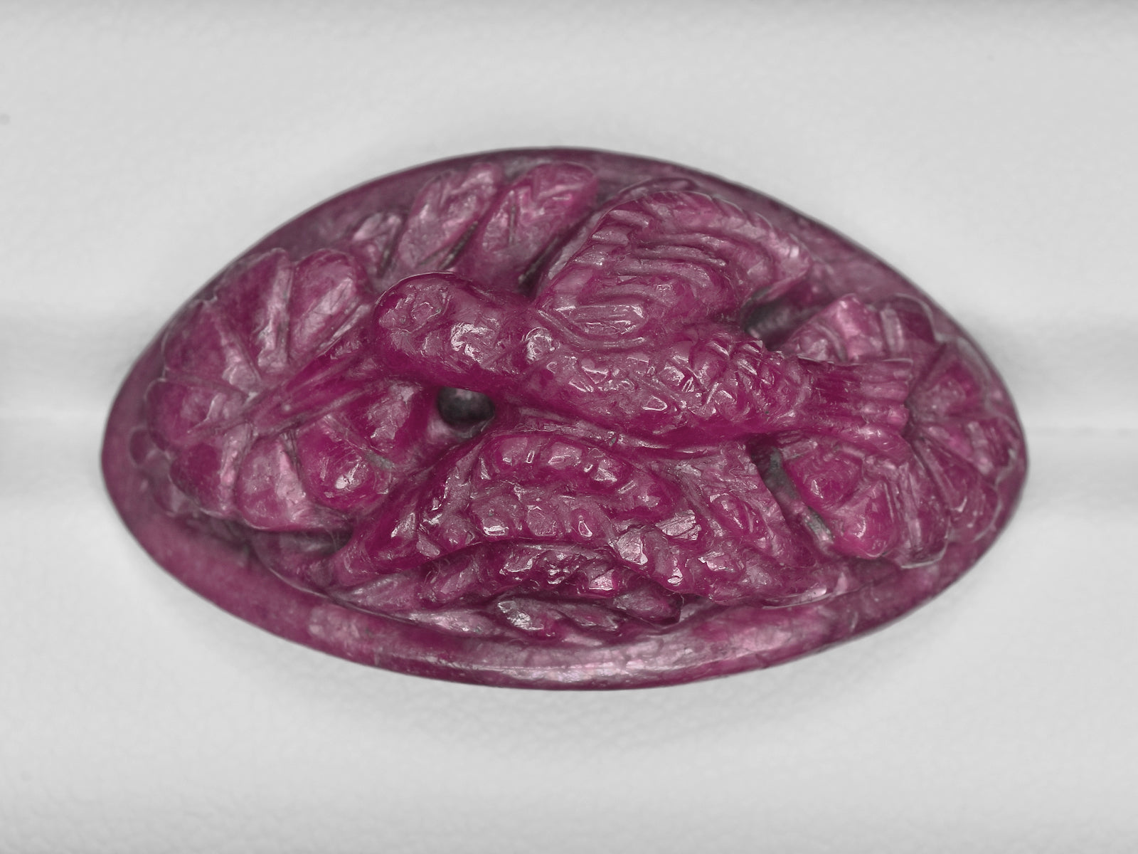8801146-carved-maroonish-red-gii-india-natural-ruby-55.32-ct