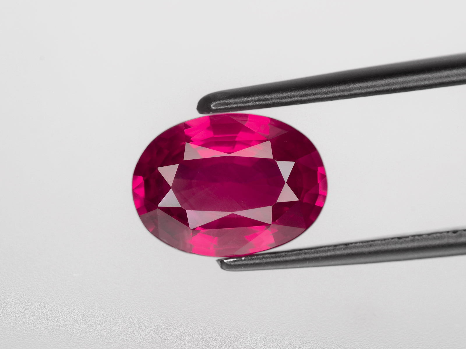 8800725-oval-velvety-pinkish-red-grs-gii-mozambique-natural-ruby-3.15-ct