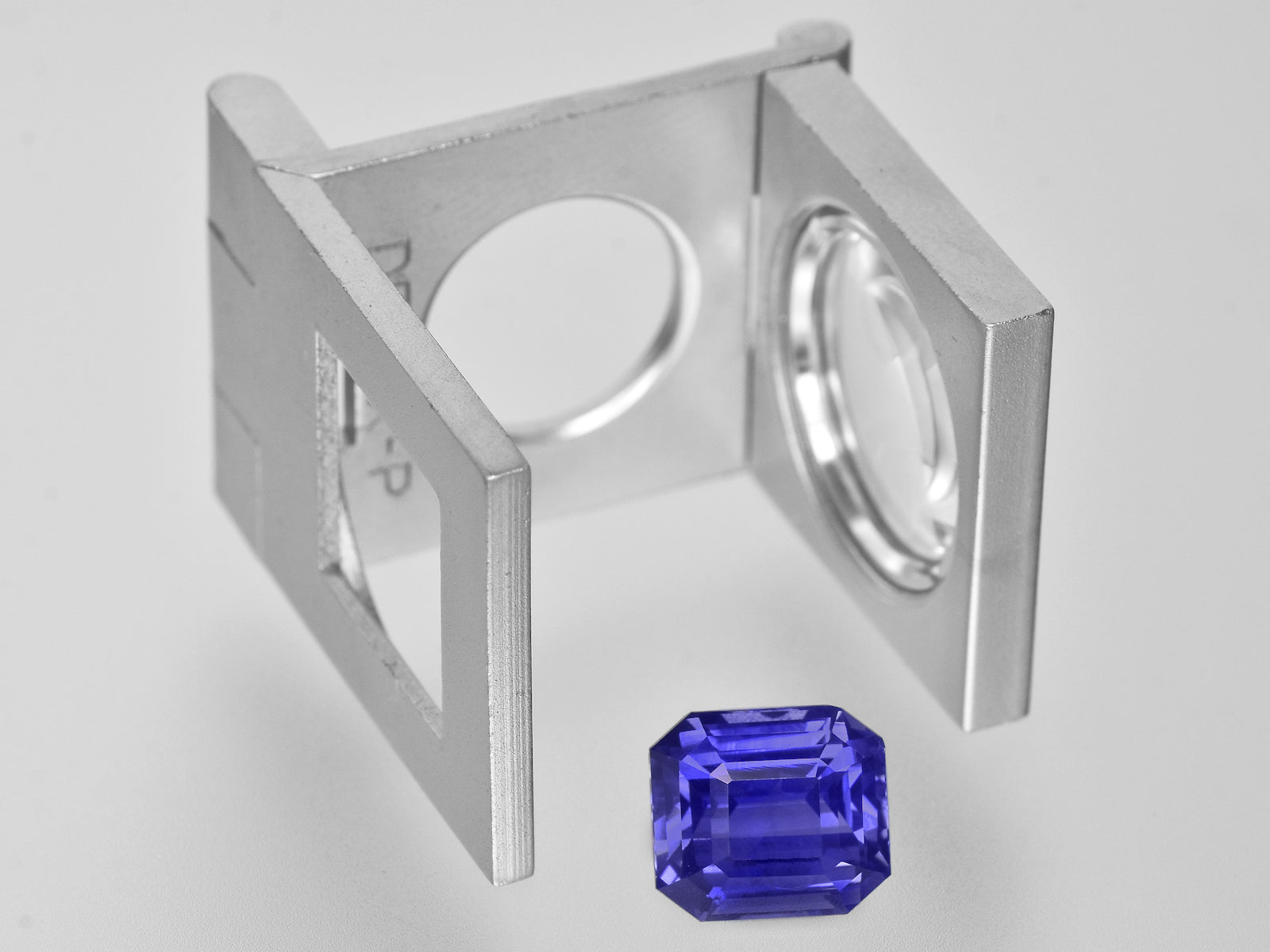 8801155-octagonal-vivid-violetish-blue-changing-to-intense-violet-gia-madagascar-natural-color-change-sapphire-5.21-ct