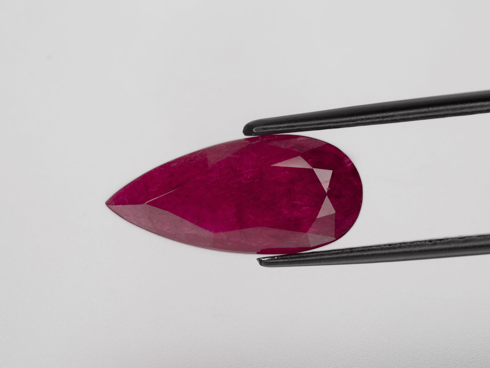 8800726-pear-deep-red-grs-gii-mozambique-natural-ruby-12.17-ct