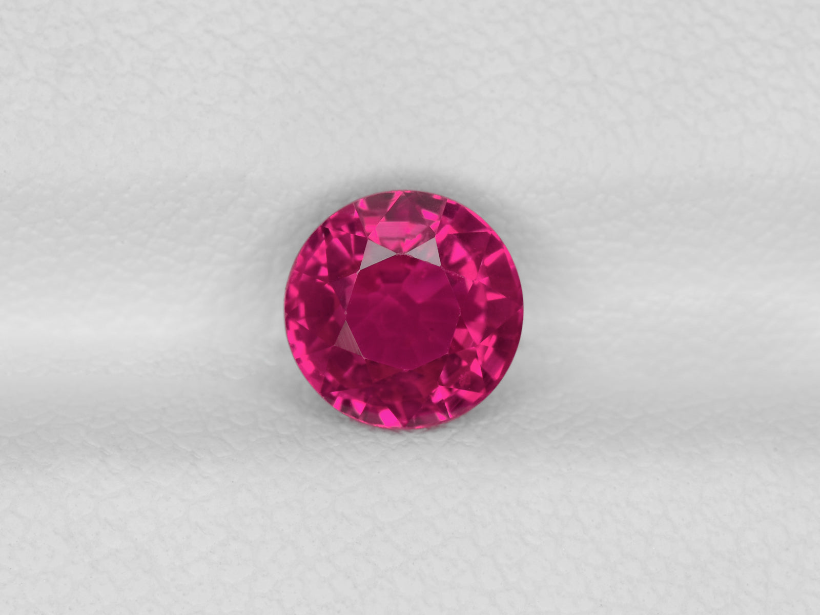 8800372-round-fiery-vivid-pinkish-red-igi-mozambique-natural-ruby-1.59-ct