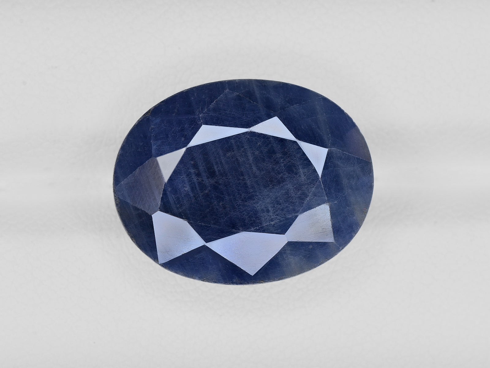 8801729-oval-dark-blue-aigs-india-natural-blue-sapphire-20.57-ct