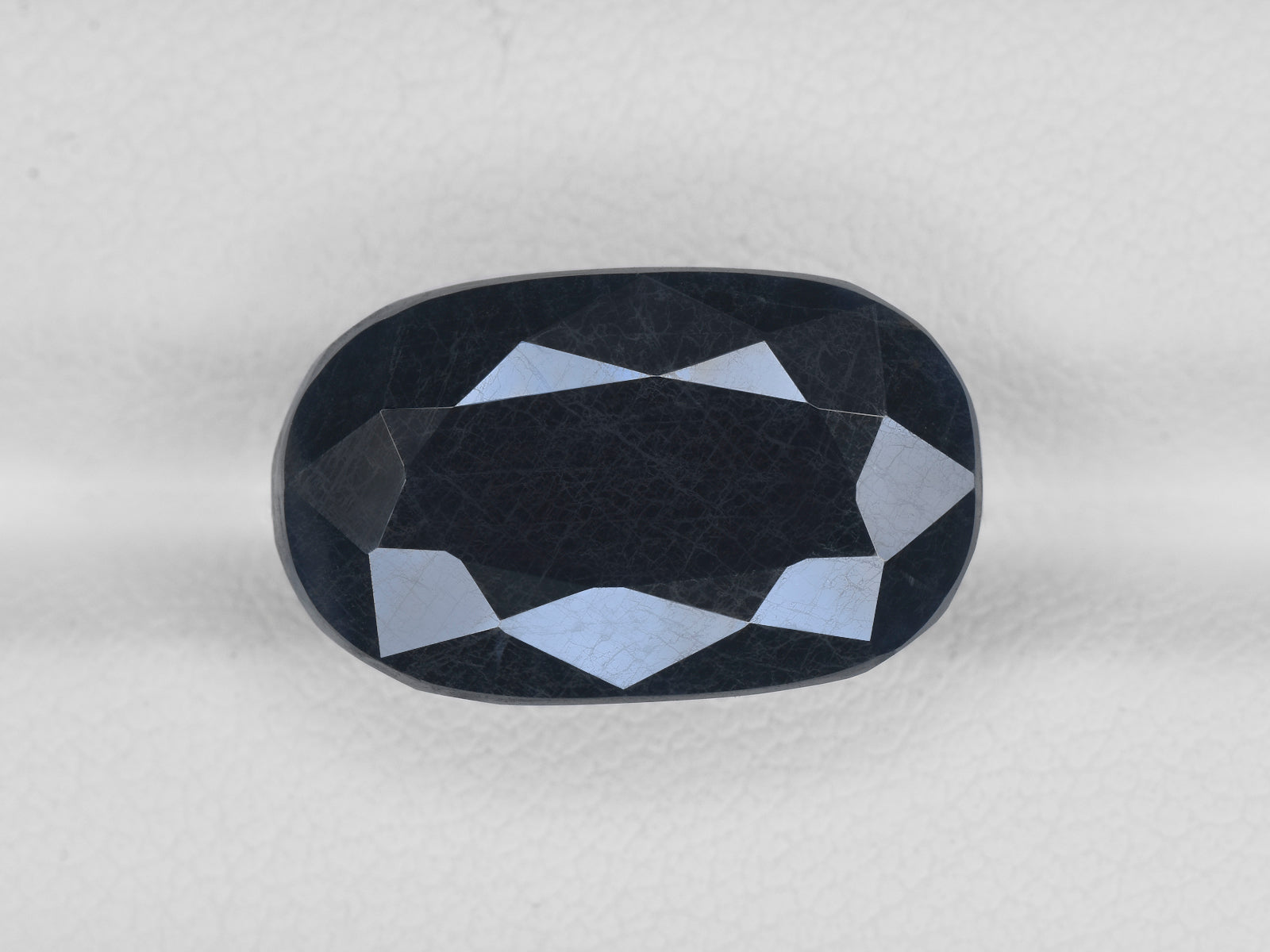 8801732-oval-blackish-blue-aigs-india-natural-blue-sapphire-15.30-ct