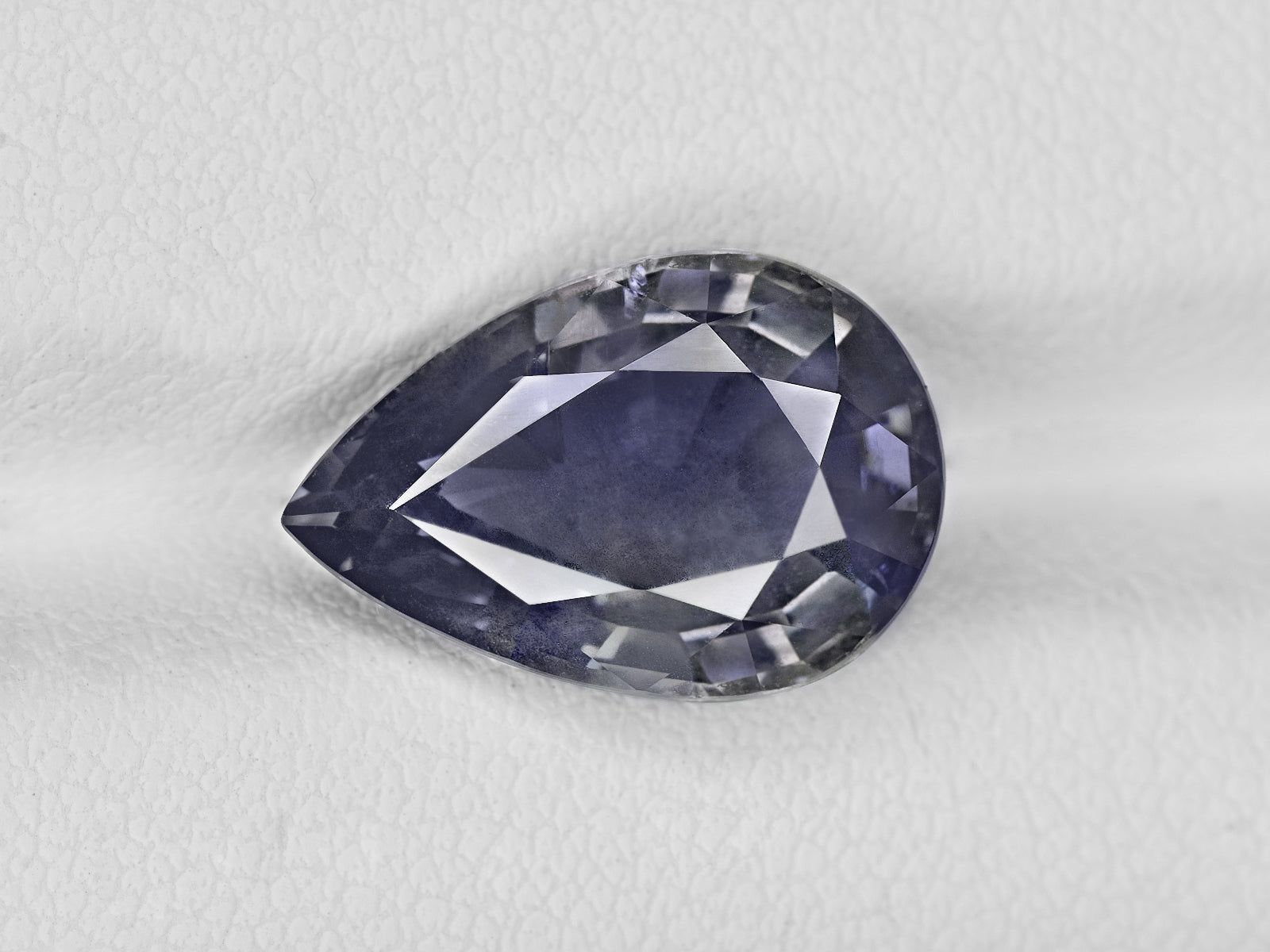 8801741-pear-greyish-violet-changing-to-deep-violet-aigs-tanzania-natural-color-change-sapphire-7.20-ct