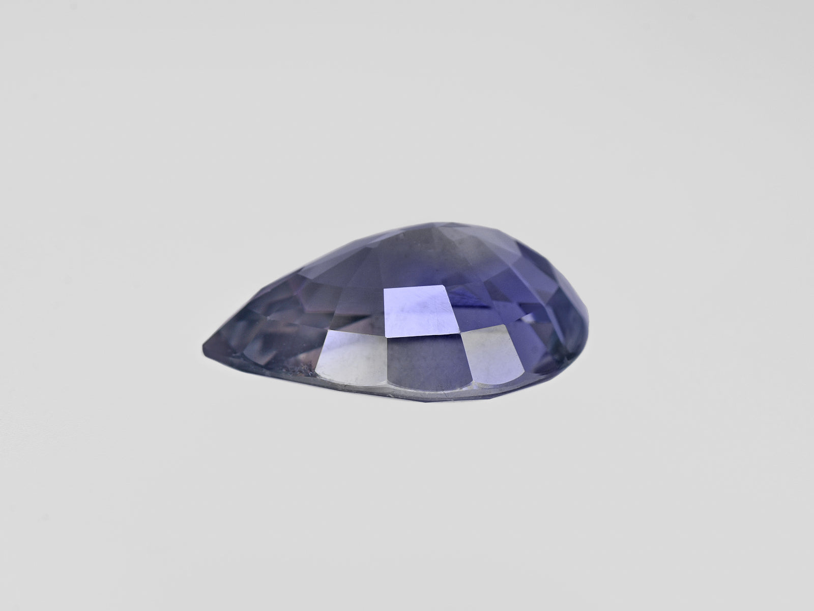 8801741-pear-greyish-violet-changing-to-deep-violet-aigs-tanzania-natural-color-change-sapphire-7.20-ct