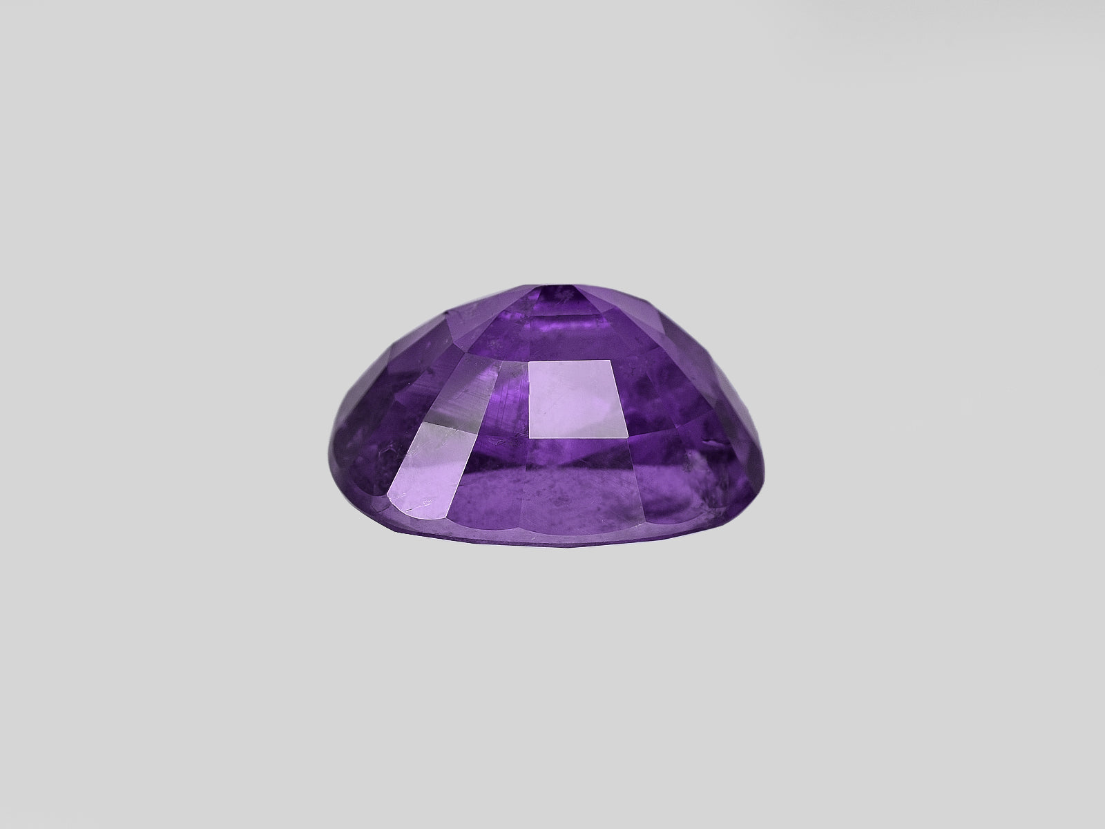 8801742-cushion-fiery-intense-purple-aigs-tanzania-natural-other-fancy-sapphire-7.26-ct