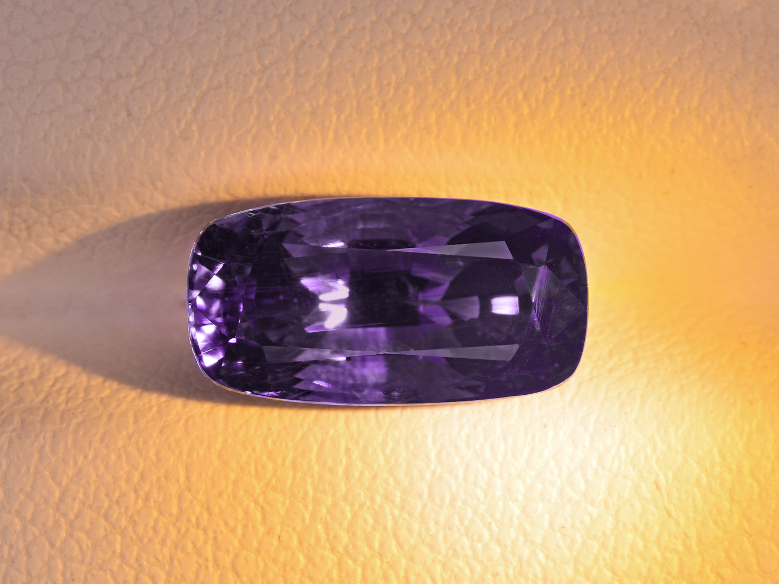 8801753-cushion-fiery-violetish-blue-changing-to-vivid-purple-grs-madagascar-natural-color-change-sapphire-4.24-ct