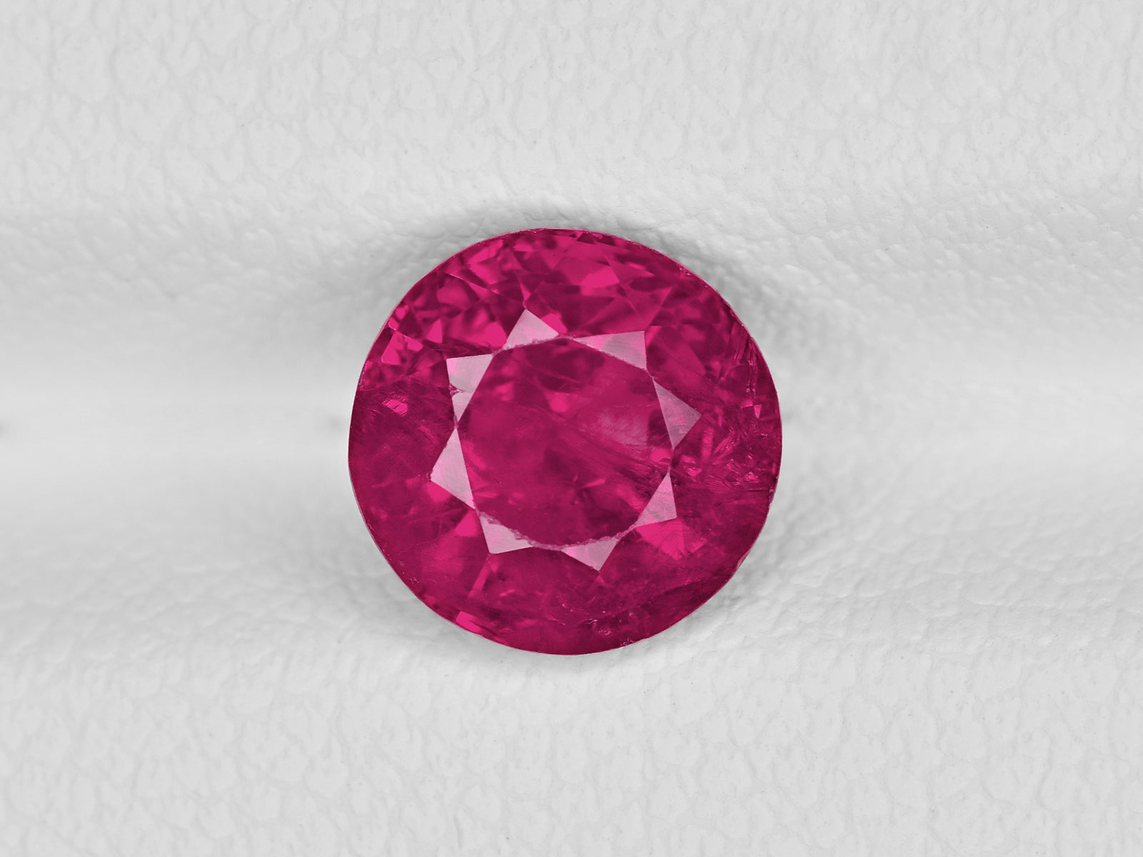8801477-round-lustrous-vivid-pinkish-red-gia-burma-natural-ruby-2.11-ct