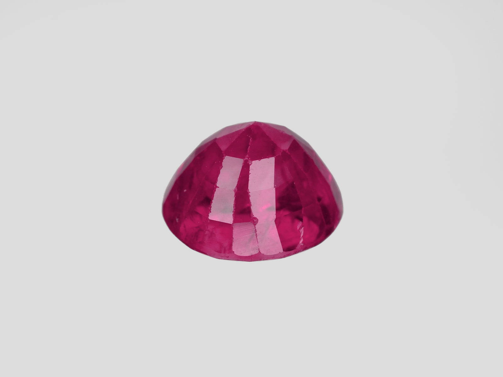 8801477-round-lustrous-vivid-pinkish-red-gia-burma-natural-ruby-2.11-ct