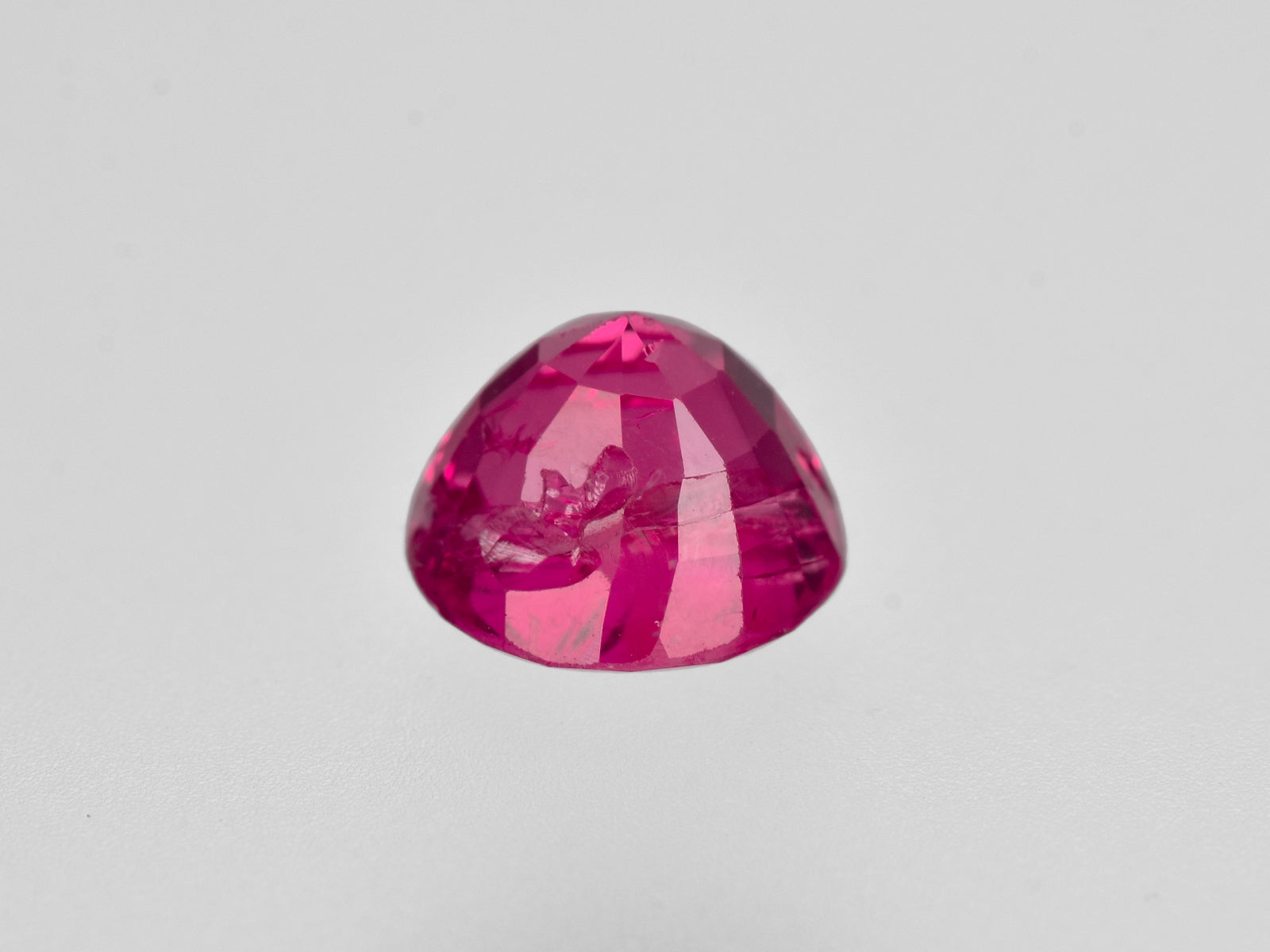 8801477-round-lustrous-vivid-pinkish-red-gia-burma-natural-ruby-2.11-ct