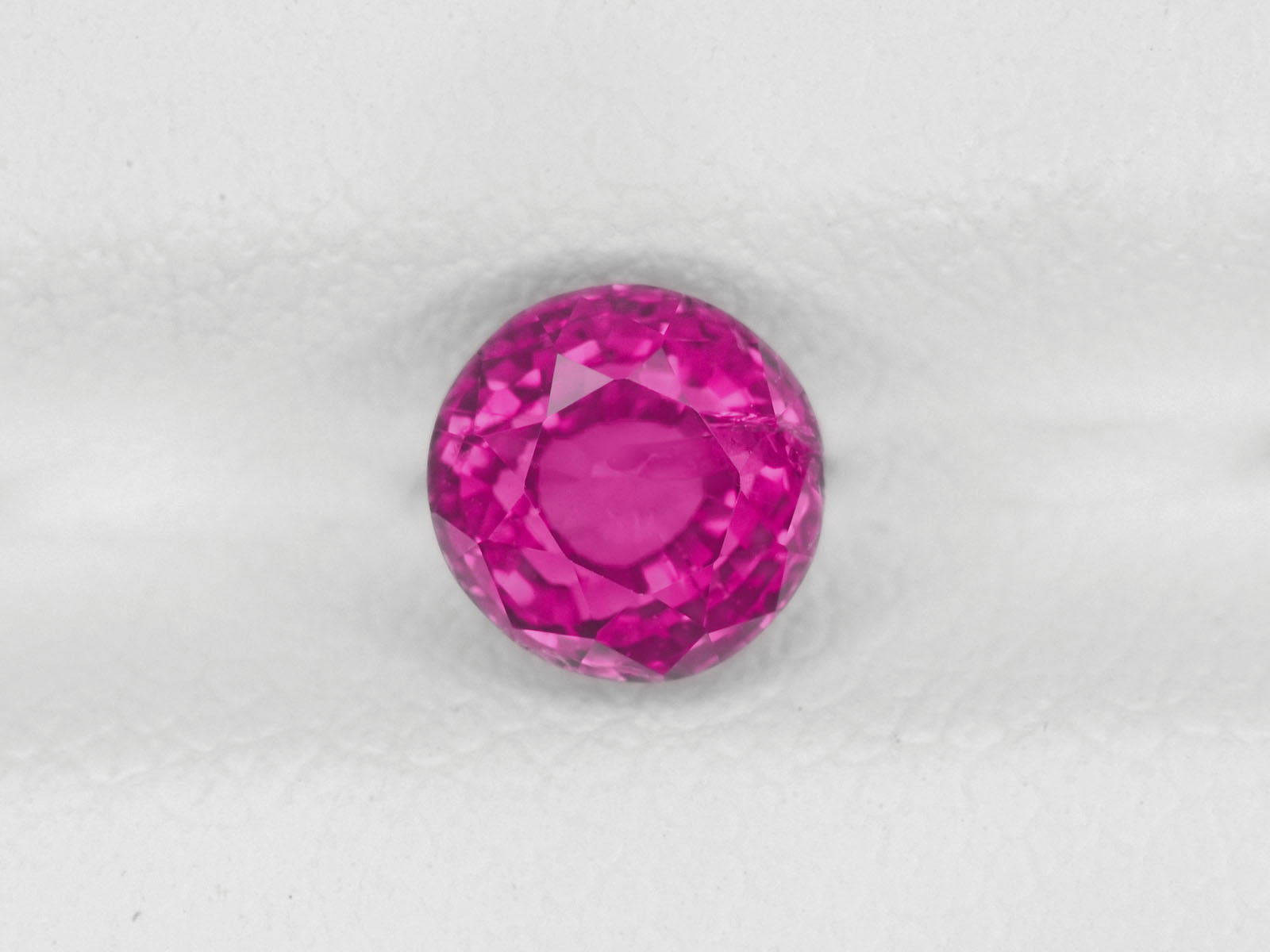 8800302-round-fiery-neon-pinkish-red-igi-madagascar-natural-ruby-1.15-ct