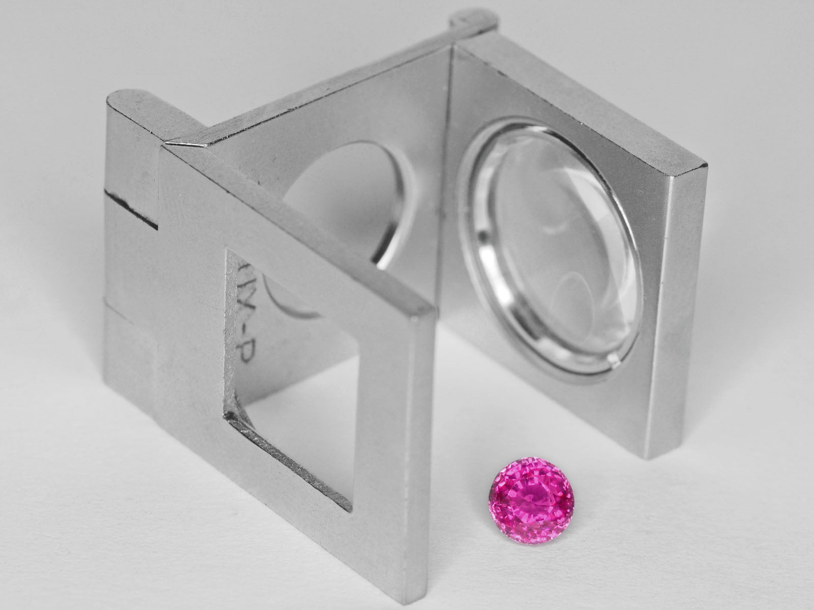8800302-round-fiery-neon-pinkish-red-igi-madagascar-natural-ruby-1.15-ct