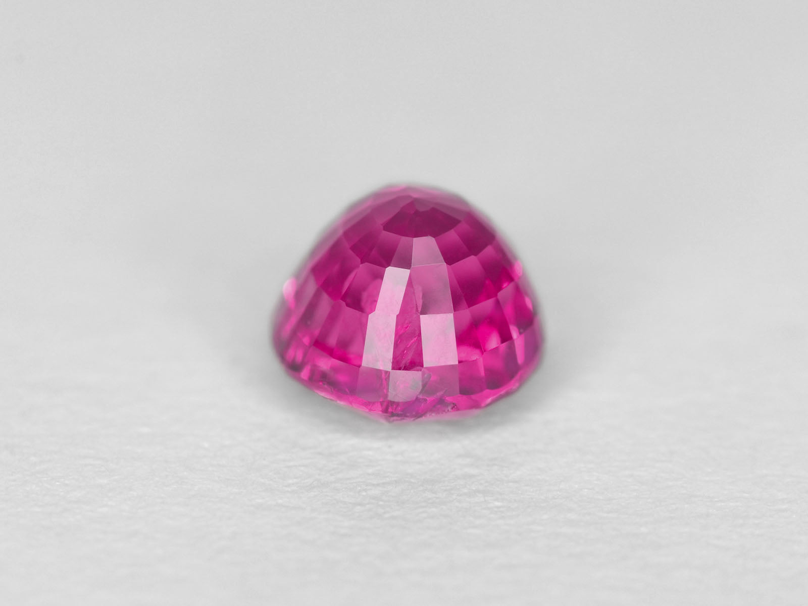 8800302-round-fiery-neon-pinkish-red-igi-madagascar-natural-ruby-1.15-ct