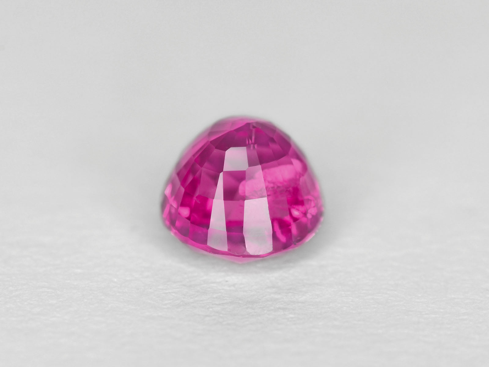 8800302-round-fiery-neon-pinkish-red-igi-madagascar-natural-ruby-1.15-ct