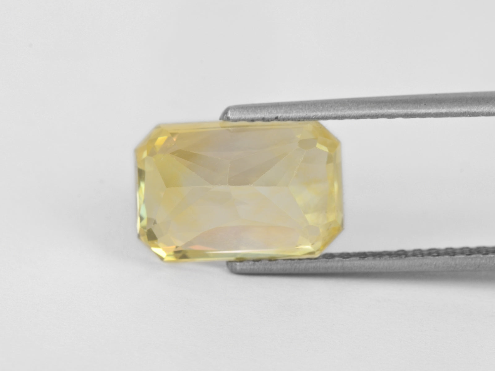 8800325-octagonal-lustrous-yellow-gia-sri-lanka-natural-yellow-sapphire-12.16-ct