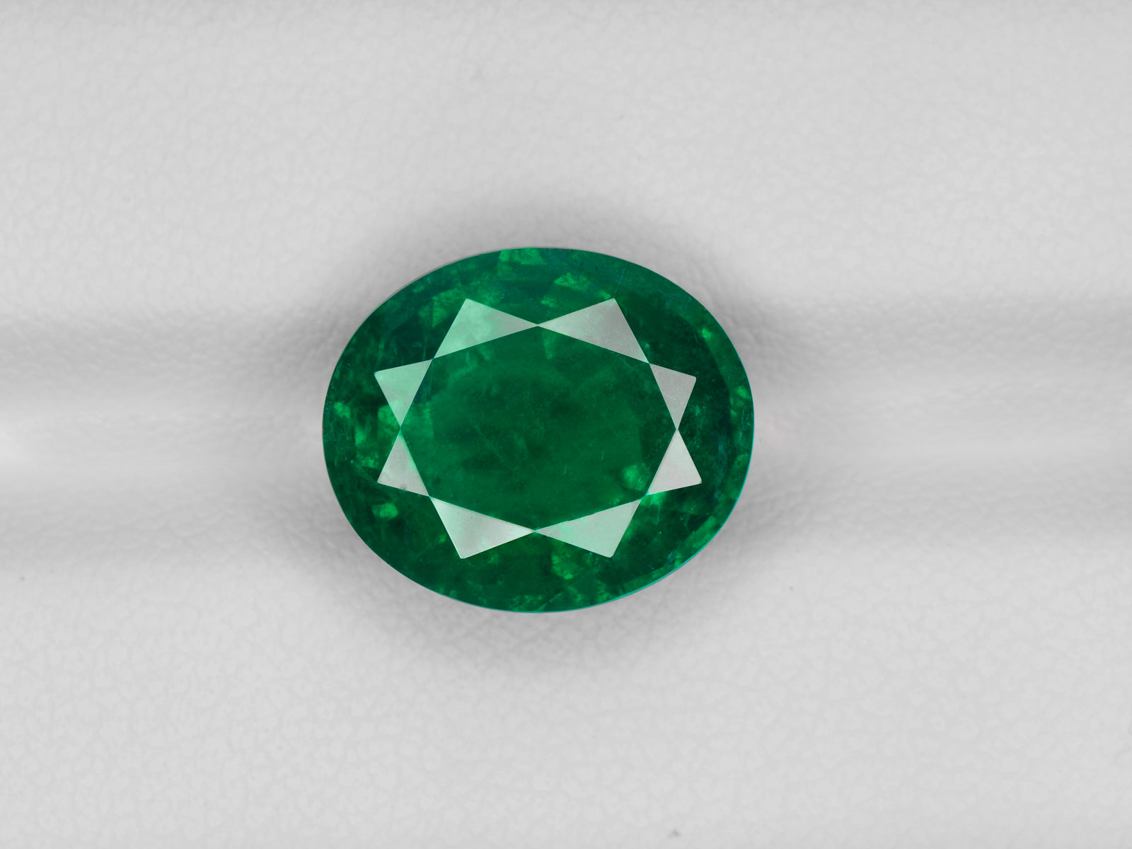 8800797-oval-rich-intense-royal-green-grs-zambia-natural-emerald-6.27-ct