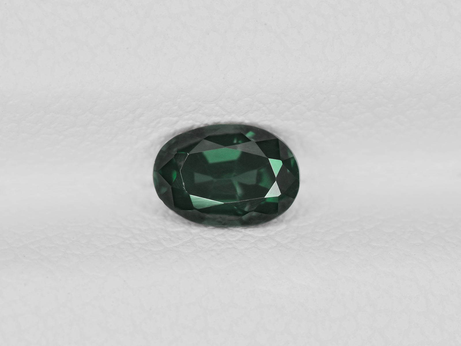 8800678-oval-dark-bluish-green-madagascar-natural-other-fancy-sapphire-0.70-ct