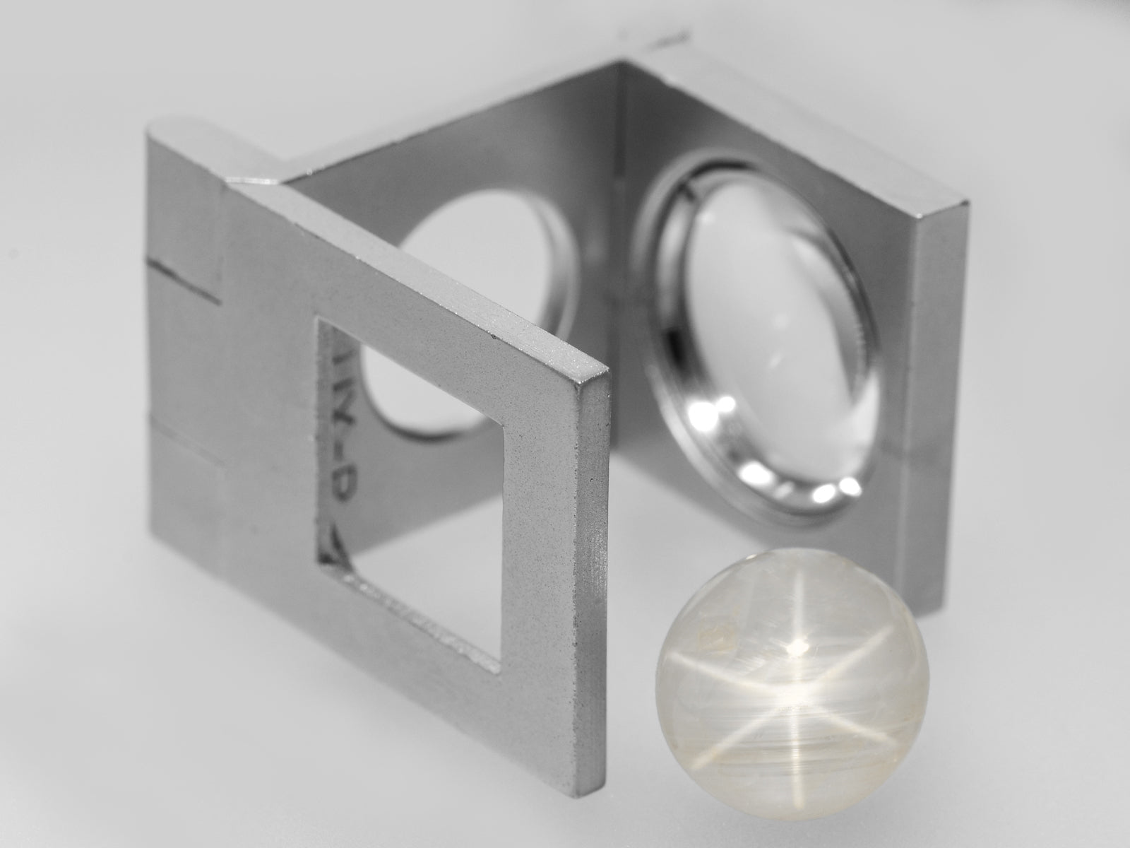 8800742-cabochon-greyish-white-igi-burma-natural-fancy-star-sapphire-10.30-ct