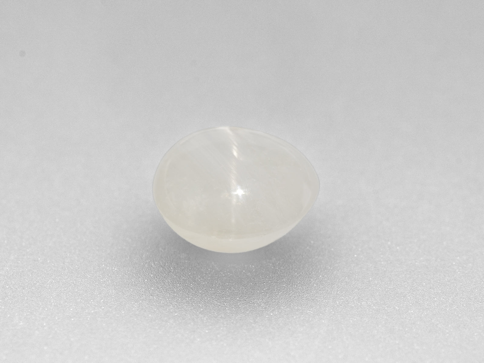 8800742-cabochon-greyish-white-igi-burma-natural-fancy-star-sapphire-10.30-ct