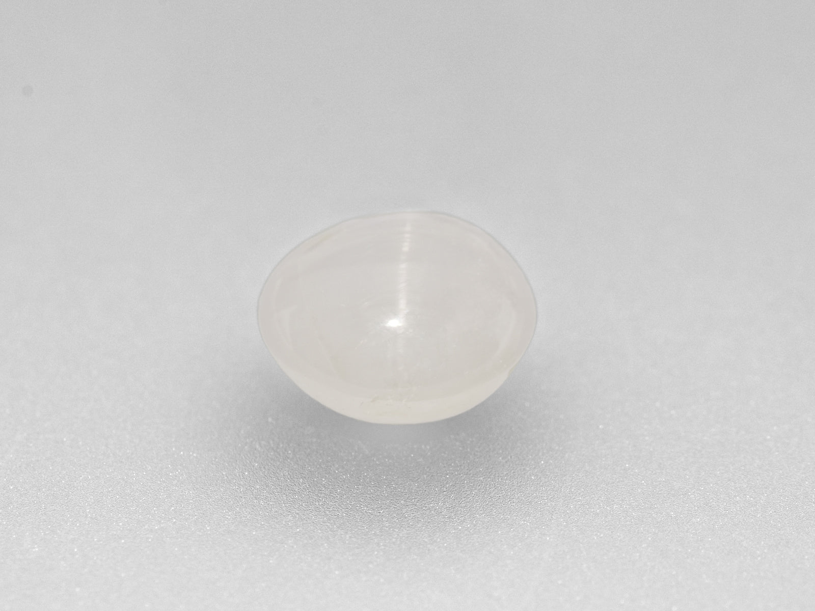 8800742-cabochon-greyish-white-igi-burma-natural-fancy-star-sapphire-10.30-ct