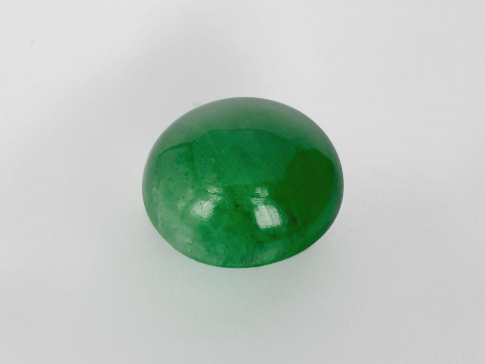 8800569-cabochon-leaf-green-russia-natural-emerald-48.28-ct